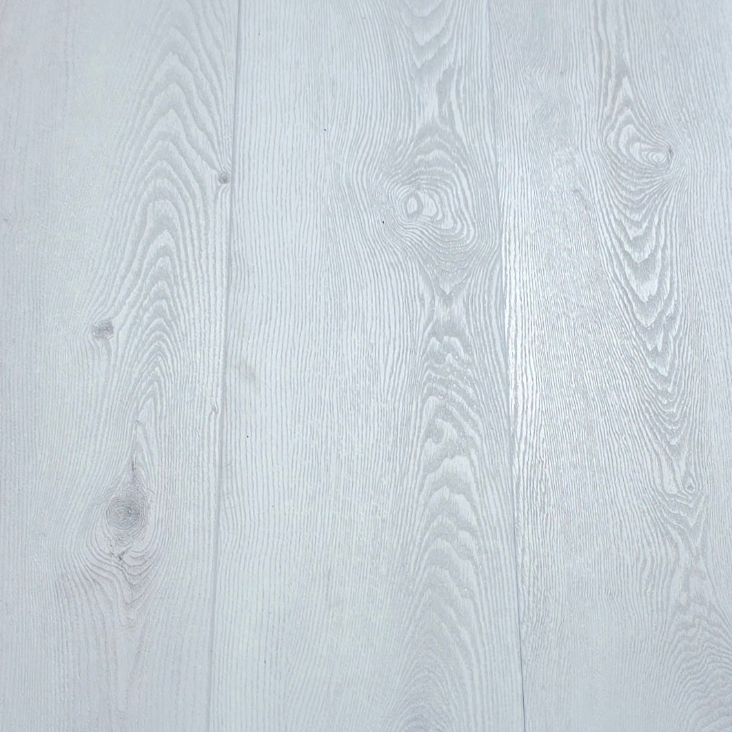 Aspen hybrid flooring closeup showing wood grain texture.