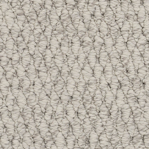 Textured beige carpet.