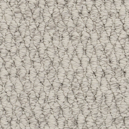 Textured beige carpet.