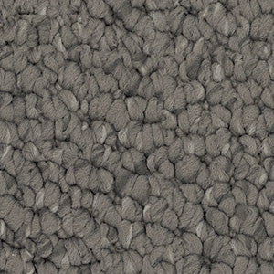 Detailed close-up of solution dyed nylon carpet featuring a chunky loop pile texture, ideal for living rooms and bedrooms. Dark Grey