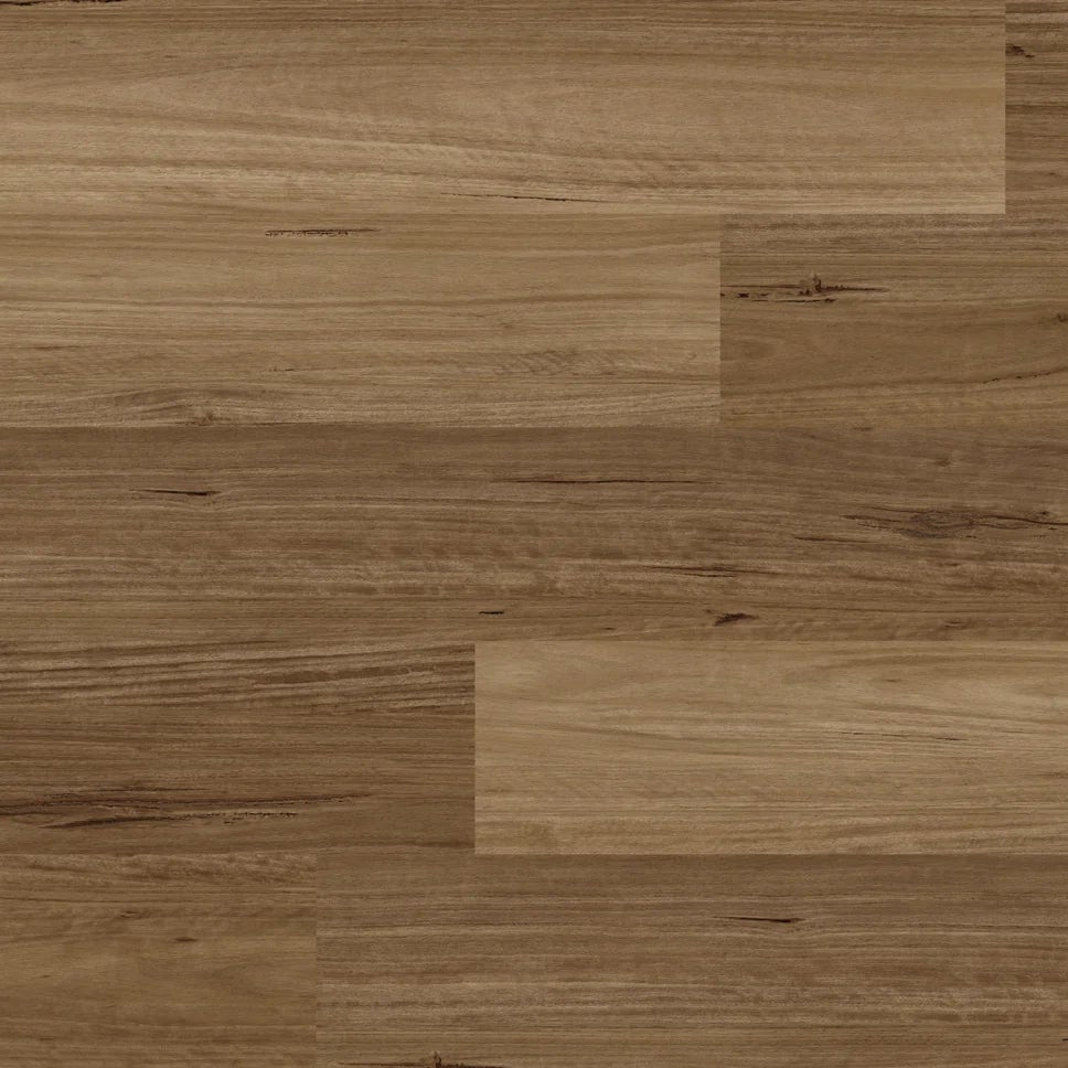 Medium brown laminate flooring planks arranged in a staggered pattern, showing natural wood grain texture.