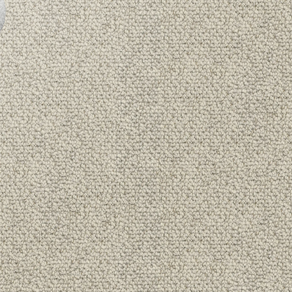 Close-up showing the chunky loop pile texture of solution dyed nylon carpet for family living spaces. Light Beige