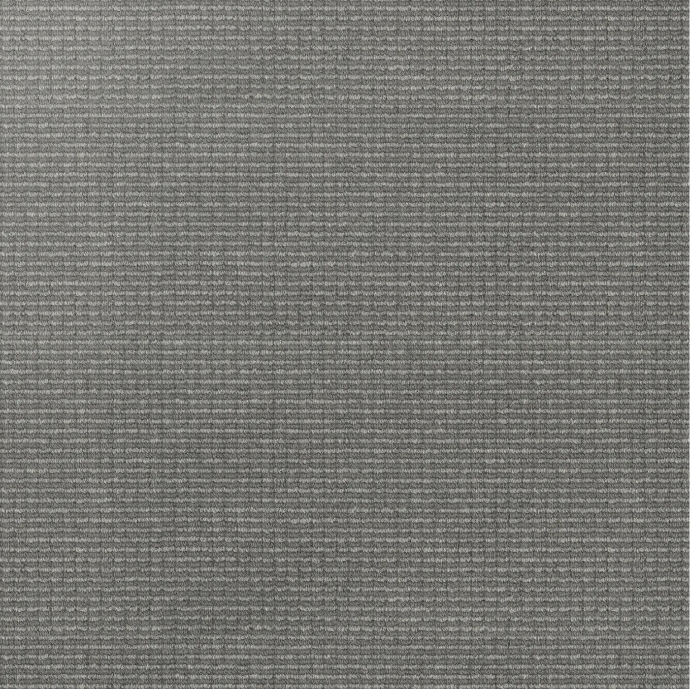 Close up of grey wool carpet showing light stripe pattern.