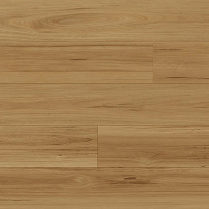 Light brown laminate flooring planks with visible natural grain and subtle variations in tone.