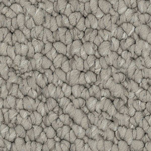 Detailed close-up of solution dyed nylon carpet featuring a chunky loop pile texture, ideal for living rooms and bedrooms. colour dark beige