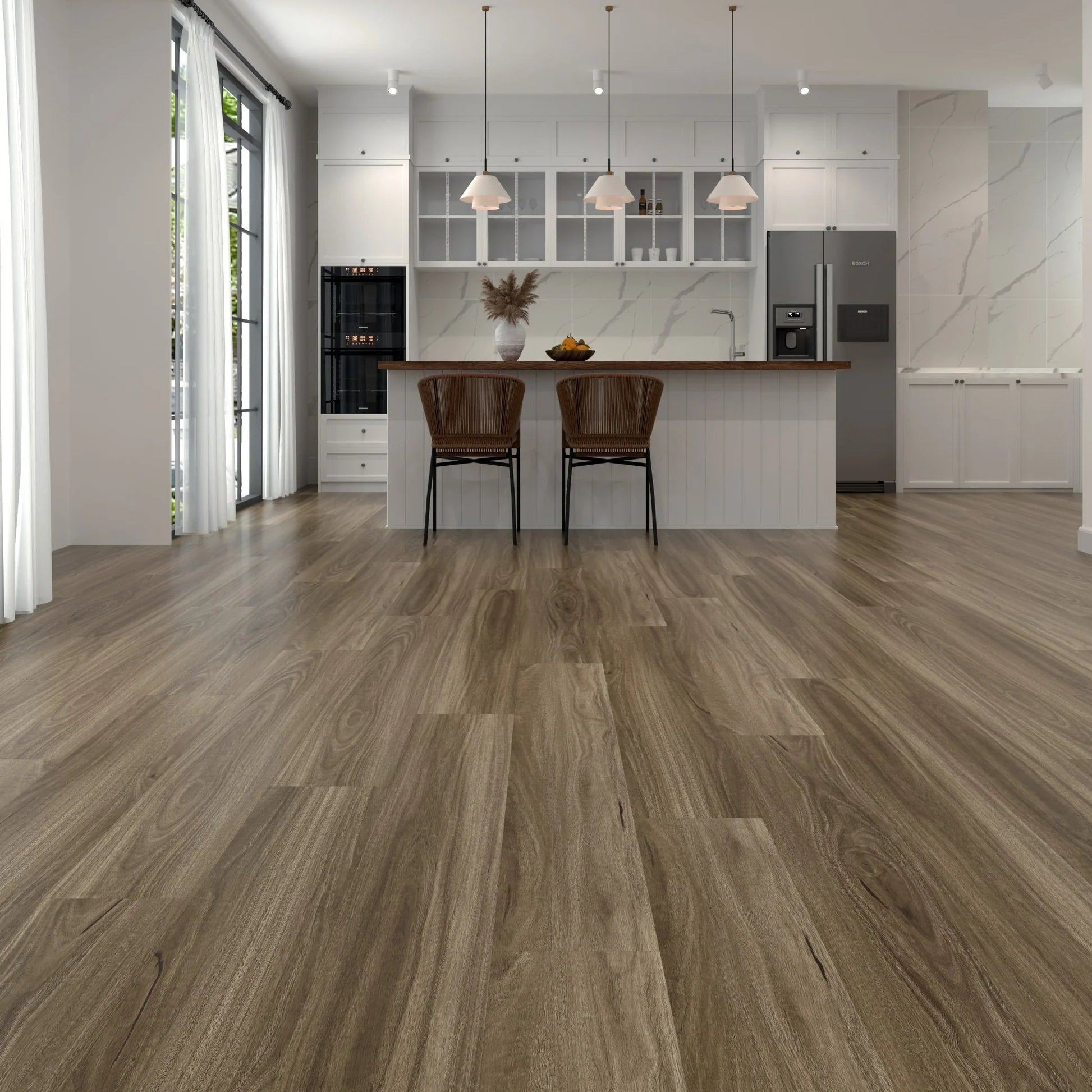 Modern kitchen with wood-look laminate flooring and white walls.