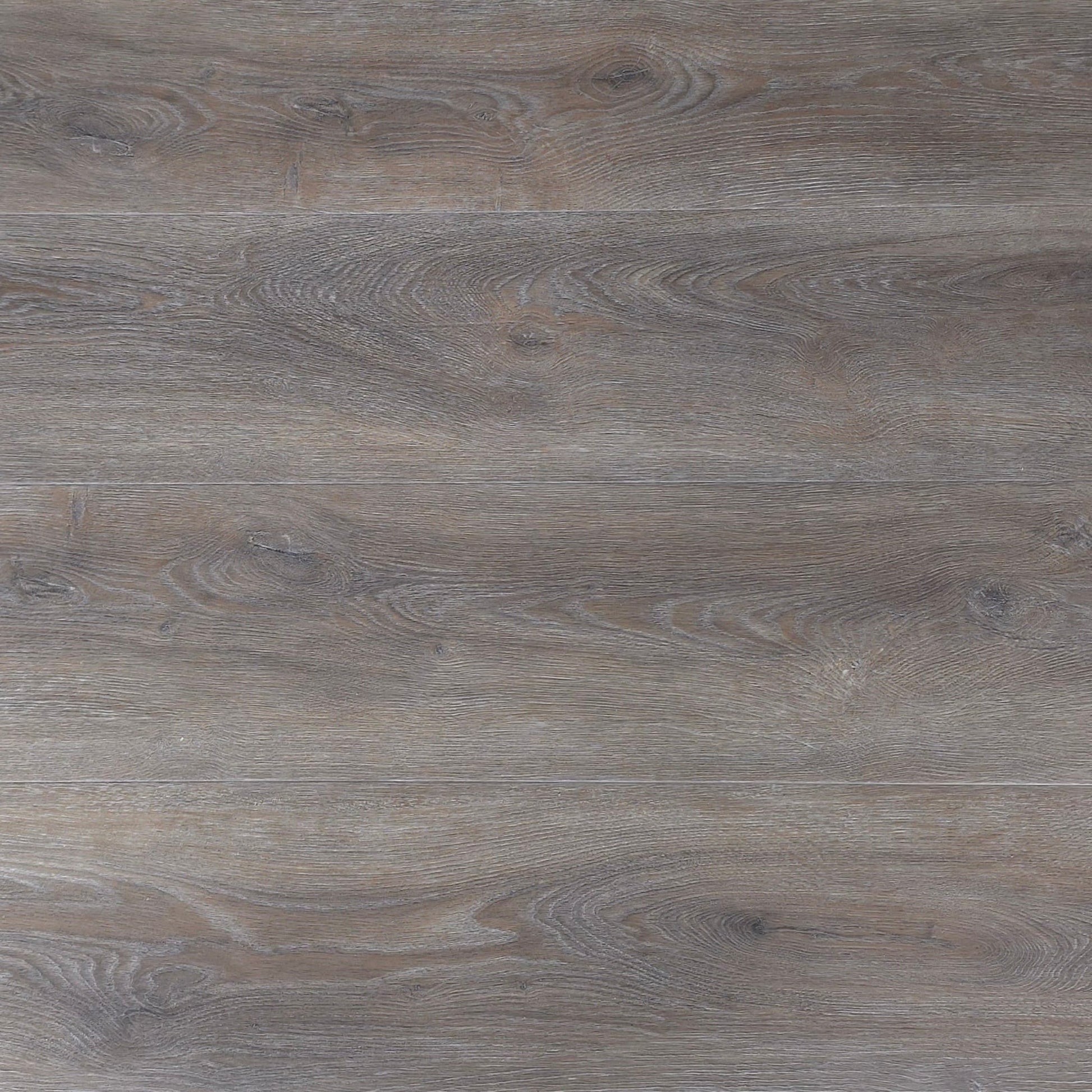 Close-up of River Driftwood Oak hybrid floooring with brown and gray tones.