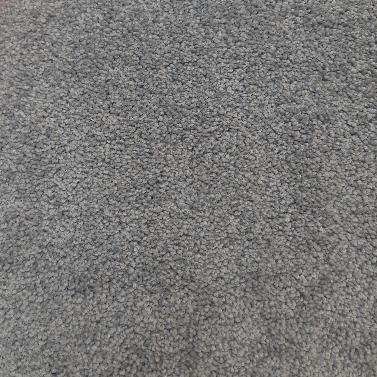Gray brown textured cut pile twist carpet 