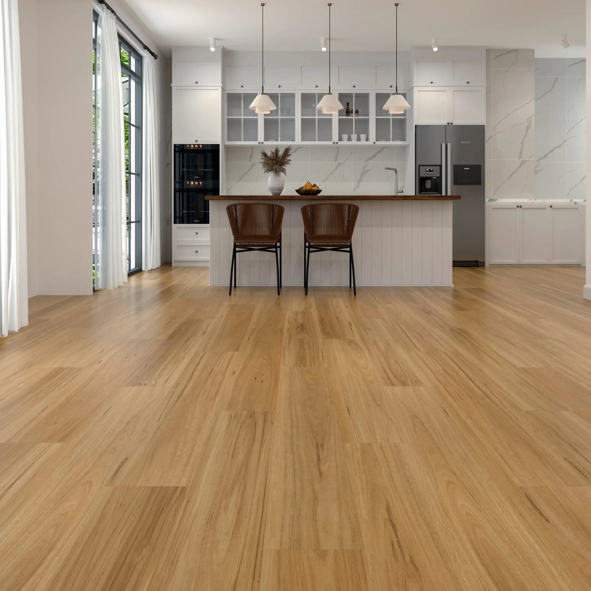 Modern kitchen with laminate flooring and white cabinets