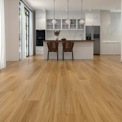 Modern kitchen with laminate flooring and white cabinets