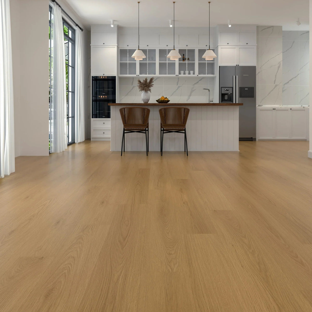 Light oak laminate flooring in a modern, bright kitchen and dining area with white cabinetry, pendant lights, and two brown bar stools at the island.