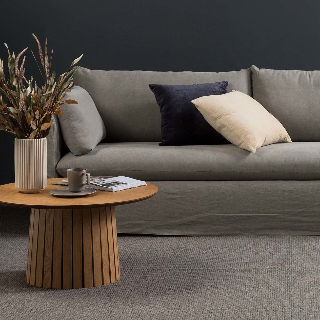 living room with sofa and Bainbridge grey carpet flooring in the colour Liberty Bay