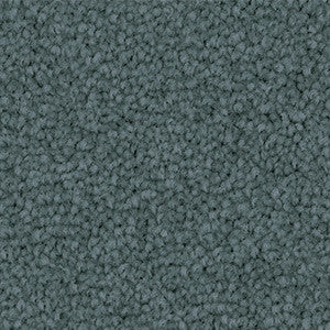 Close up of Godfrey Hirst Inspirational Blue Shadow carpet sample showing soft cut pile twist triexta texture in a muted deep blue tone.