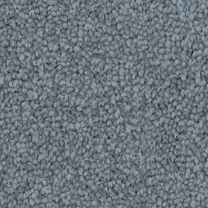 Close-up texture of Soft Sunrise triexta carpet fibres in blue grey colour