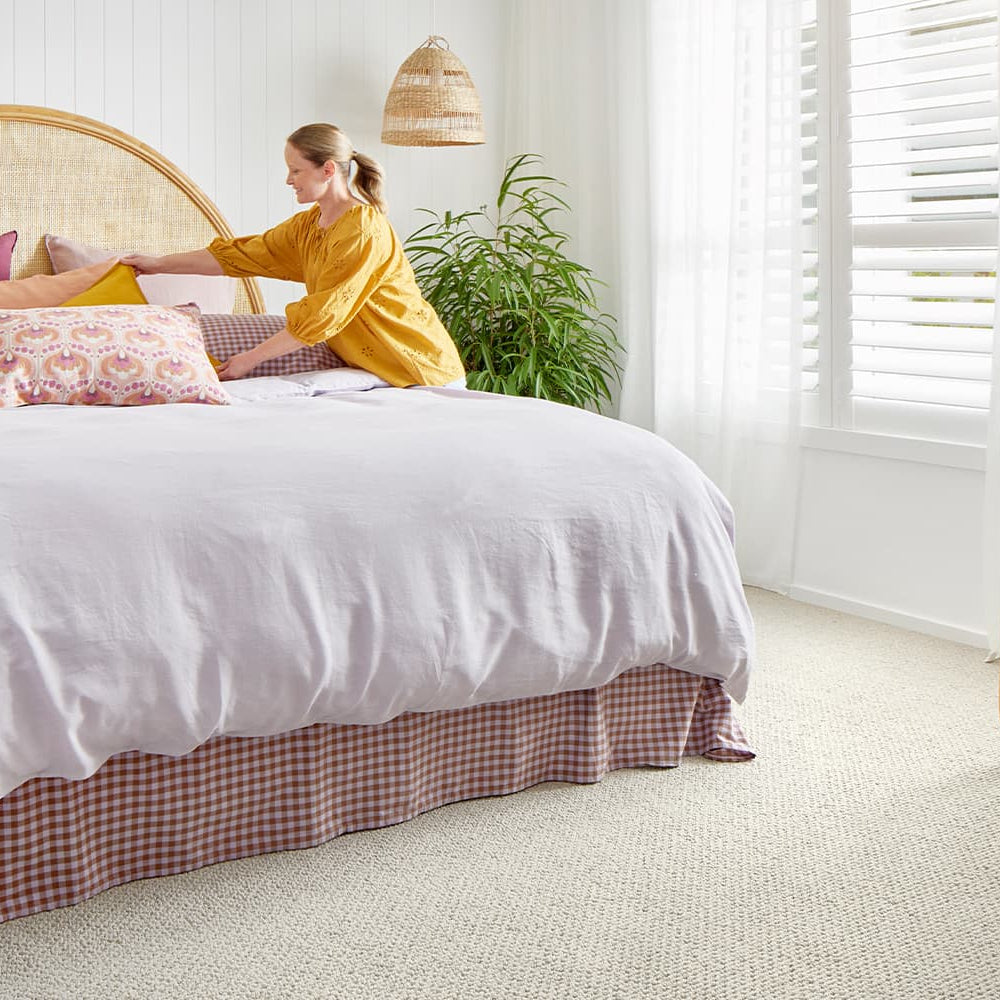  bright bedroom with a comfortable carpet in colour beige