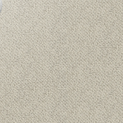 Close-up showing the chunky loop pile texture of solution dyed nylon carpet for family living spaces. Beige