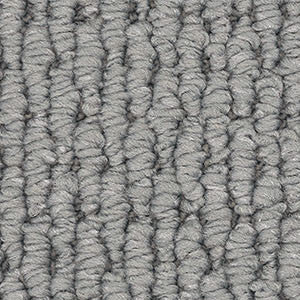 Detailed view of silver Redbook Central Valley loop pile carpet, stain-resistant nylon.