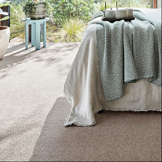 Comfortable Bedroom with soft, light brown carpet