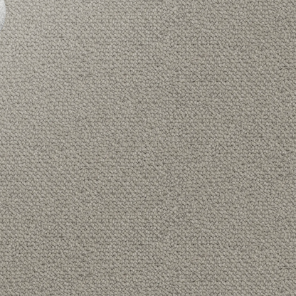 Close-up showing the chunky loop pile texture of solution dyed nylon carpet for family living spaces. Medium Beige