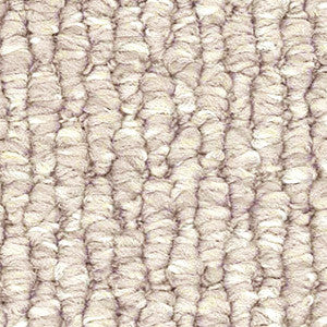 Detailed view of light beige Redbook Central Valley loop pile carpet, stain-resistant nylon."