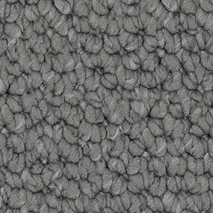 Detailed close-up of solution dyed nylon carpet featuring a chunky loop pile texture, ideal for living rooms and bedrooms. Dark Grey colour